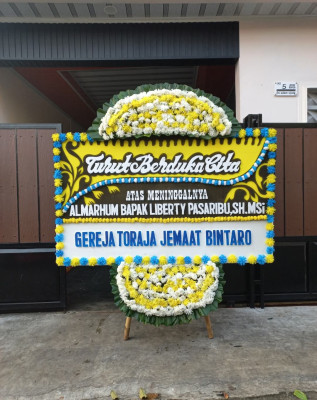 Papan Bunga Duka di Purwasari